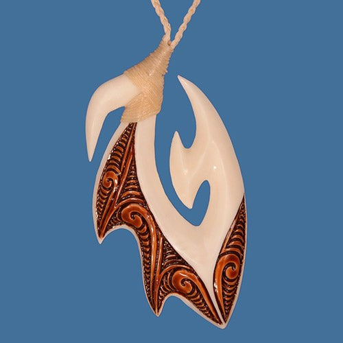 Brown stained M?ori bone carving necklace featuring a bound hook pendant on an adjustable black wax cord.