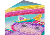 Whimsical unicorn-themed notebook with rhinestone painting; includes 50 lined pages and creative art supplies.