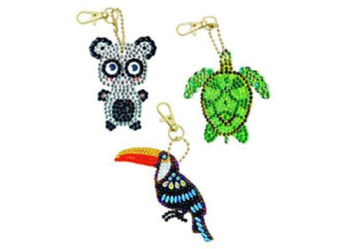 Colorful CrystalArt keyring kit featuring Turtle, Toucan, and Meerkat designs for creative DIY crafting.