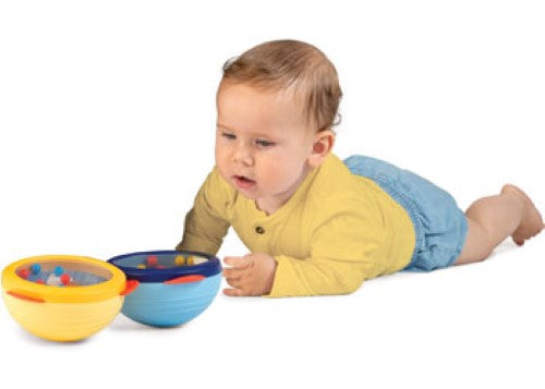 Halilit Tummy Time Rock N Roll toy set with colorful hemispheres promoting sensory skills and fun during tummy time.