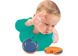 Colorful interlocking discs for infants, promoting tummy time, motor skills, and sensory exploration with gentle sounds.