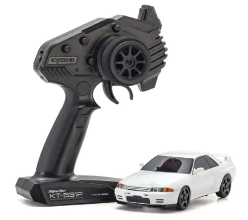 Radio Control Kyosho MA020 Nissan GT-R (R32) in white, a detailed RC car with high performance and customizable features.