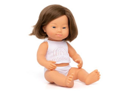 Caucasian girl doll with Down Syndrome, 38cm, soft vinyl, articulated limbs, promoting empathy and inclusivity in play.