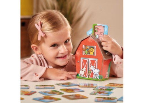 Colorful 3D barn surrounded by chunky cards for matching farm animals with their babies, designed for preschool learning.