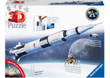 3D jigsaw puzzle of the iconic Apollo Saturn V rocket, featuring three stages, astronaut figurines, and a removable lunar module.