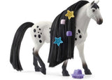 Stunning Schleich Knabstrupper Stallion figurine with a unique spotted coat, ideal for collectors and imaginative play.