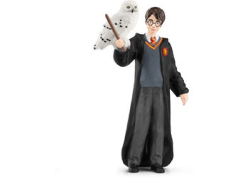 Harry Potter in Gryffindor uniform with wand and glasses, alongside his loyal snowy owl, Hedwig, for magical adventures.
