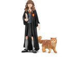 Detailed figurine set of Hermione Granger with wand and Crookshanks, perfect for magical play and collection.