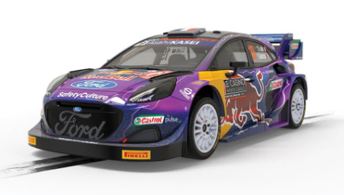 Slot car model of WRC Ford Puma R1 Loeb, featuring detailed design, powerful motor, and authentic rally livery.