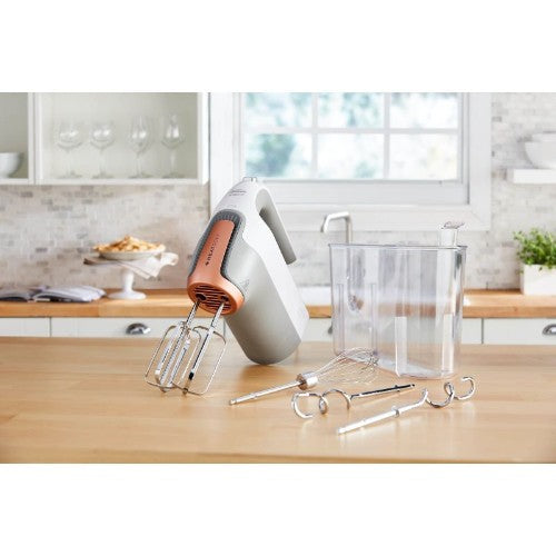 Sunbeam JM7000 MixMaster HeatSoft Hand Mixer with unique heating tech, 7 speeds, stainless steel accessories, and storage case.