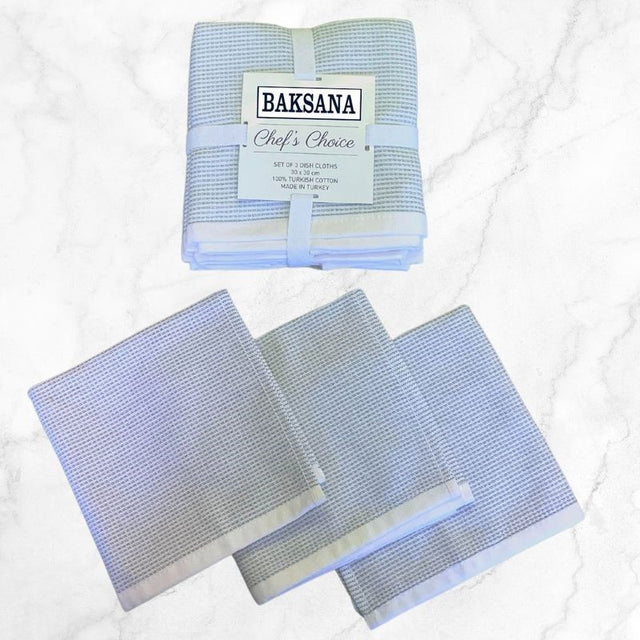 Set of 3 grey BAKSANA dish cloths, 100% cotton, OEKO-TEX® certified, stylish and functional kitchen essentials.