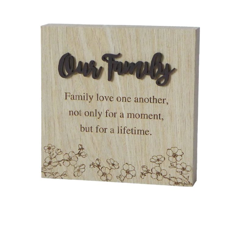 Wooden plaque featuring the saying "Family love one another, not only for a moment, but for a lifetime," ideal for home decor.