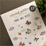 Vibrant Patchwork Sharks wall decals for children's rooms, made from eco-friendly fabric, easy to apply and reposition.