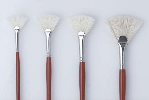 Premium Hog bristle fan brush with red handle, ideal for fine details and broader strokes in oil and acrylic painting.