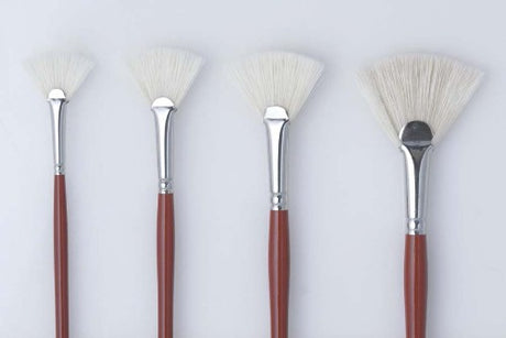 Premium Hog bristle fan brush with red handle, ideal for fine details and broader strokes in oil and acrylic painting.
