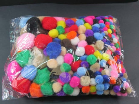 Bright and colorful pom poms in assorted sizes, perfect for DIY crafts, scrapbooking, and seasonal decorations.