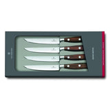 Victorinox Grand Maître 4-piece steak knife set with rosewood handles and precision blades for effortless meat slicing.