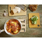 Natural wood composite trivet, 18x18cm, durable, heat-resistant up to 350°F, with non-slip silicone feet.
