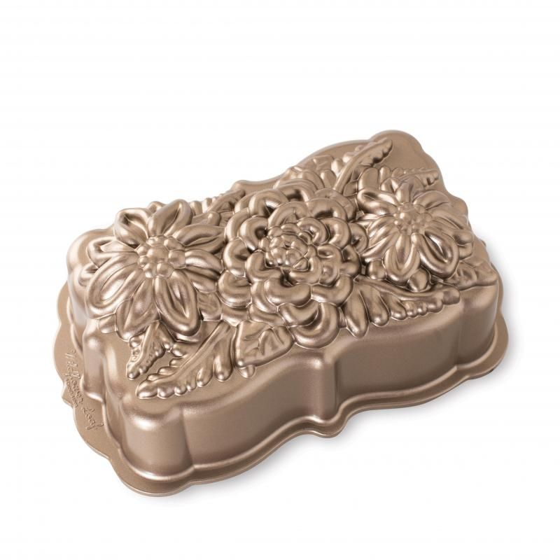 Nordic Ware Toffee Wildflower Loaf Pan featuring intricate floral designs, perfect for baking artisanal breads and cakes.