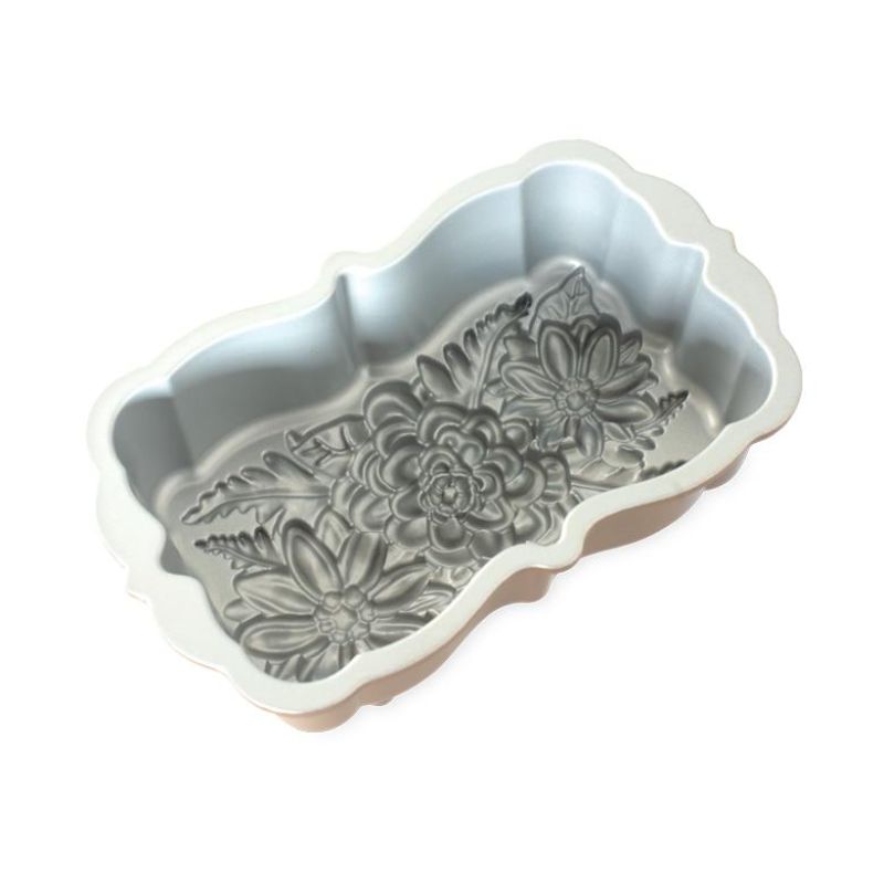 Nordic Ware Wildflower Loaf Pan in Toffee, featuring intricate floral designs and a 6-cup capacity for delightful baked goods.