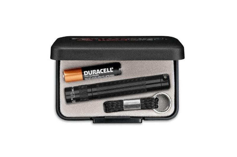 Maglite Solitaire LED flashlight in black presentation box, featuring 47 lumens, waterproof, and focusable beam.