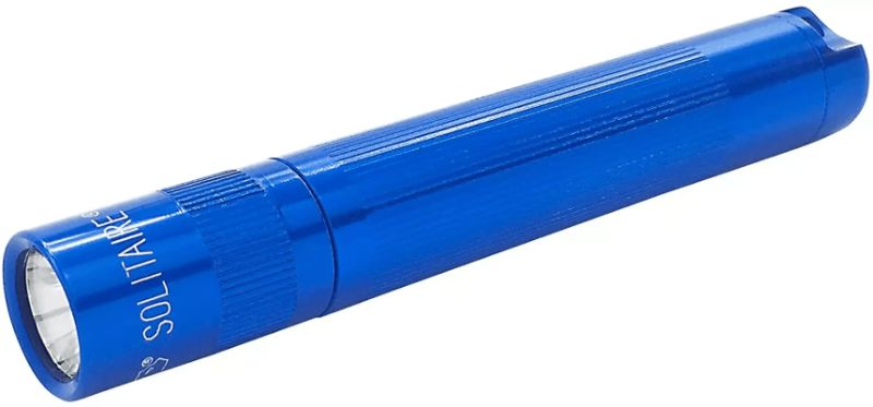 Maglite Solitaire LED flashlight in a blue presentation box, featuring durable aluminum, water resistance, and adjustable beam.