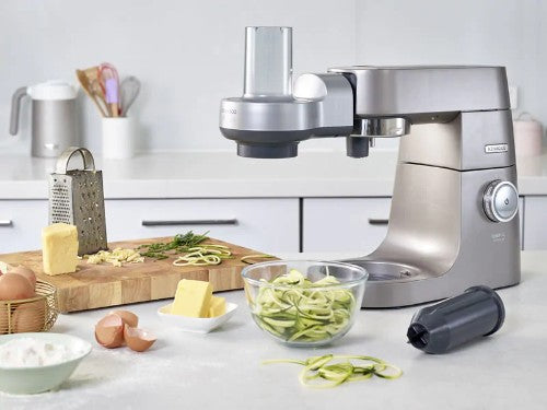 Grey spiralizer attachment for KVC, KVL, Chef XL Sense, and KMX series kitchen machines, made of durable plastic.