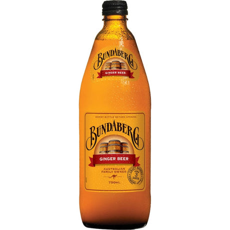 Bottle of Bundaberg Ginger Beer showcasing real ginger pieces, brewed over 3 days for a refreshing Australian flavor.