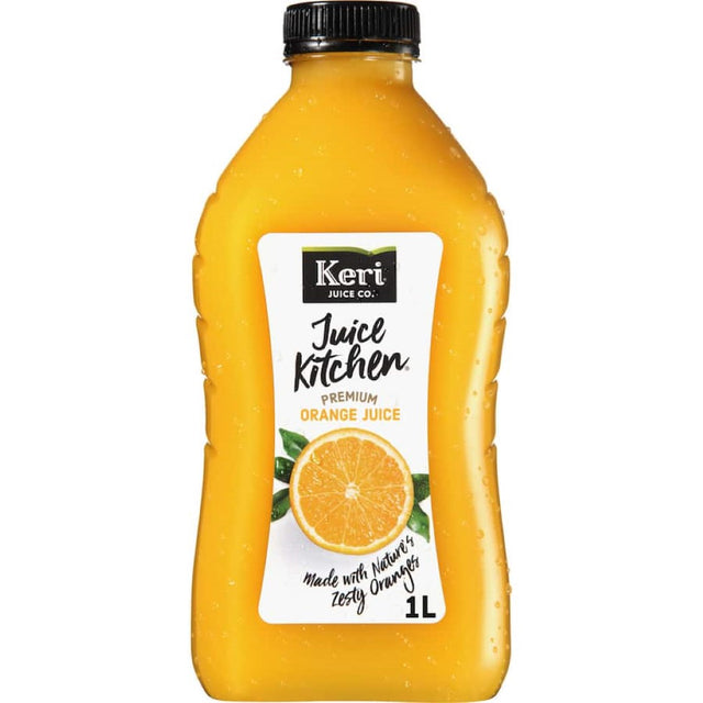 Keri Premium Orange Juice in a bottle, showcasing its vibrant color and emphasizing no added sugars and natural flavor.