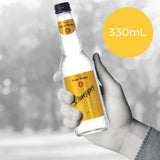 Refreshing Schweppes Indian Tonic Water 330ml, perfect mixer for gin with crispness and natural quinine.