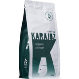 Karajoz Plunger Grind Organic coffee features rich flavors of chocolate and toffee, ideal for smooth plunger brewing.