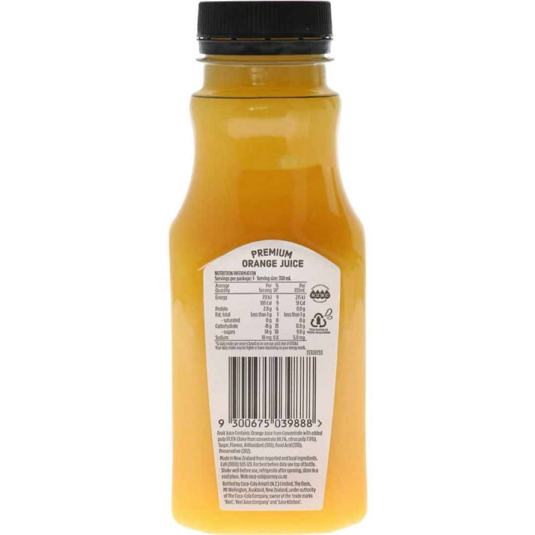 A bottle of Keri Orange Juice showcases vibrant orange liquid, emphasizing its premium, no added sugar, healthy refreshment.