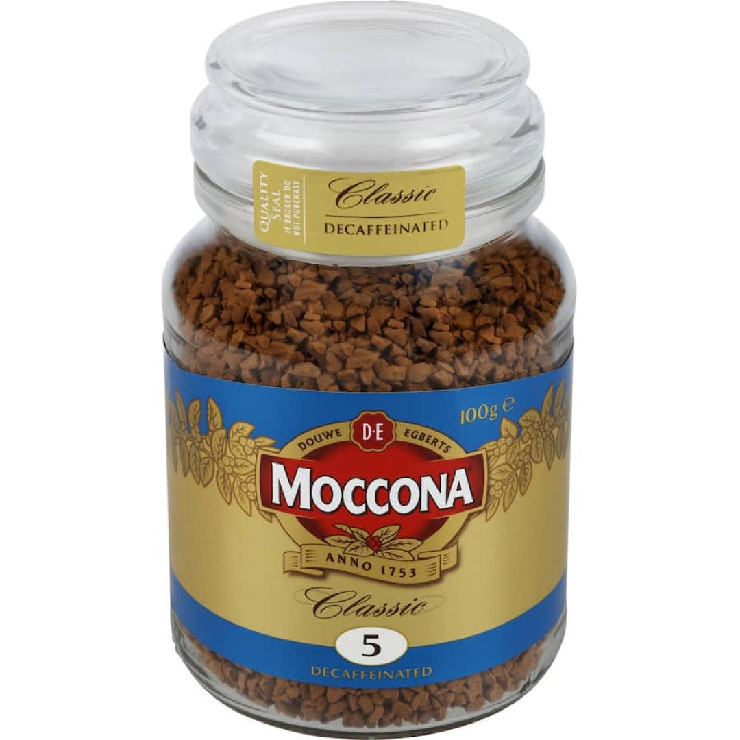 Moccona Classic Decaffeinated Instant Coffee in a 100g glass jar, offering rich flavor with 0-0.3% caffeine for a soothing coffee experience.