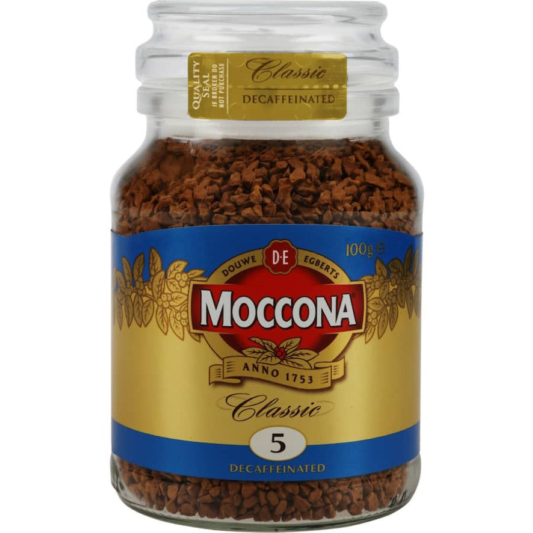 Glass jar of Moccona Classic Instant Freeze Dried Decaffeinated Coffee, offering rich flavor with 0-0.3% caffeine for relaxation.