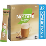 Nescafe Coffee Sachets Hazelnut 26 Pack, offering creamy hazelnut lattes with sustainably sourced coffee for easy home enjoyment.