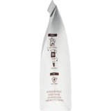 A pyramid tea bag of Ti Ora Infusion Green Tea with ginger and lemongrass, promoting refreshment and sustainability.
