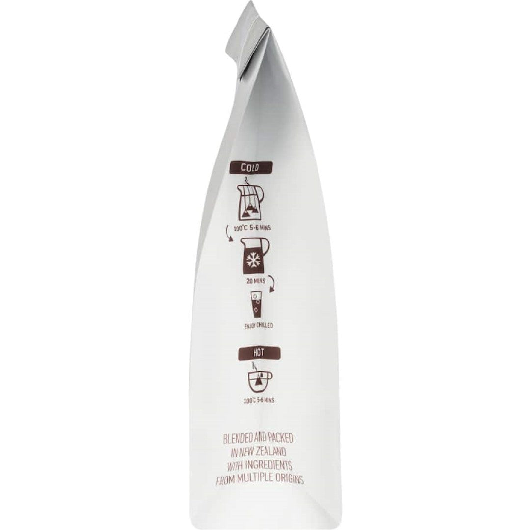 Ti Ora Infusion Green Tea with peach and passionfruit in eco-friendly packaging, featuring 15 plant-based pyramid tea bags.