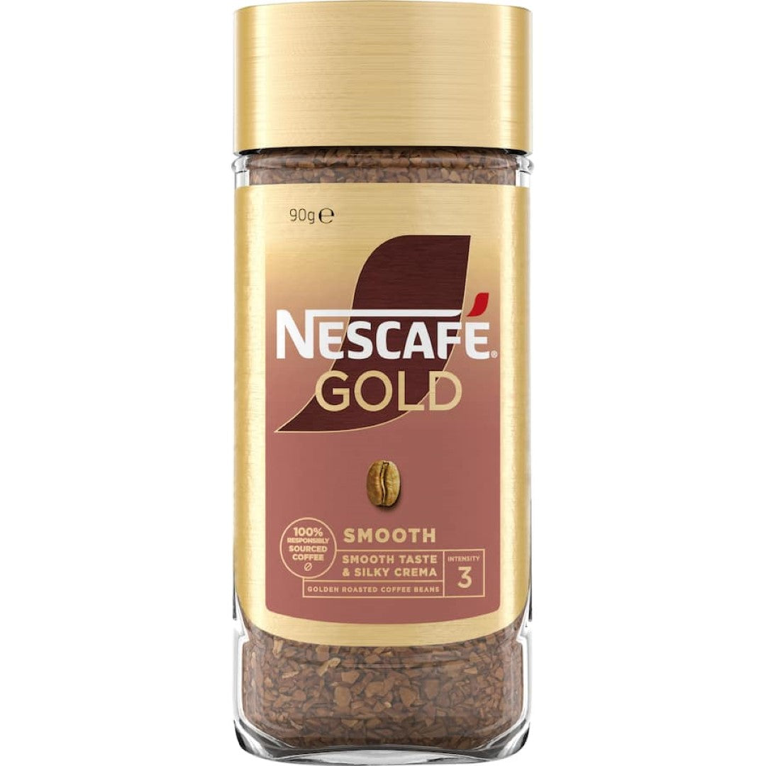 A steaming cup of Nescafe Gold Instant Coffee Smooth topped with a golden crema, ideal for a rich, convenient coffee experience.