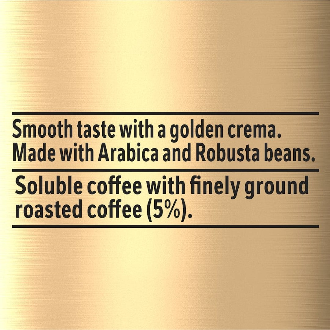 A steaming cup of Nescafe Gold Instant Coffee Smooth with a golden crema, ideal for quick, delicious coffee at home.