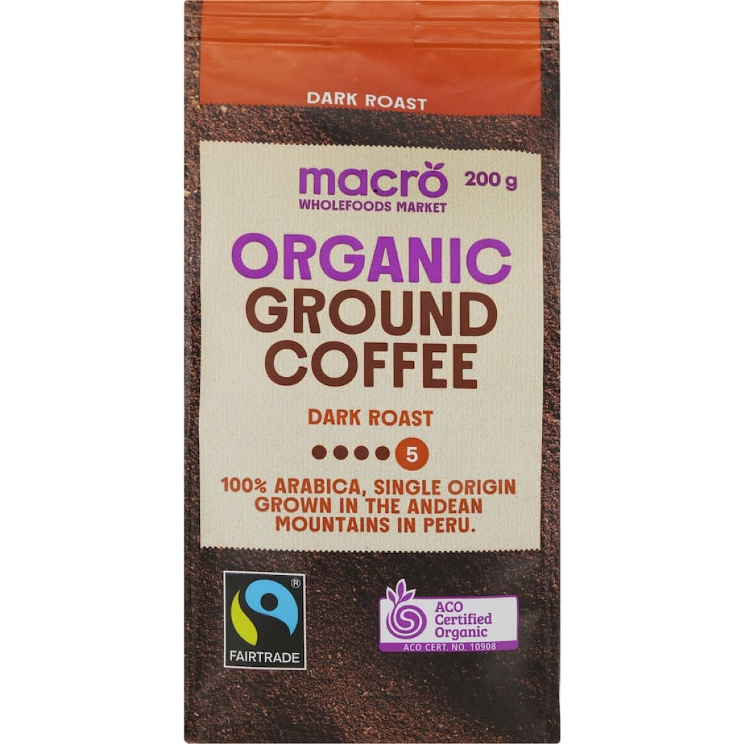 A bag of Macro Organic Fair Trade Ground Coffee Dark Roast showcasing its rich Peruvian coffee, promoting sustainability and quality.