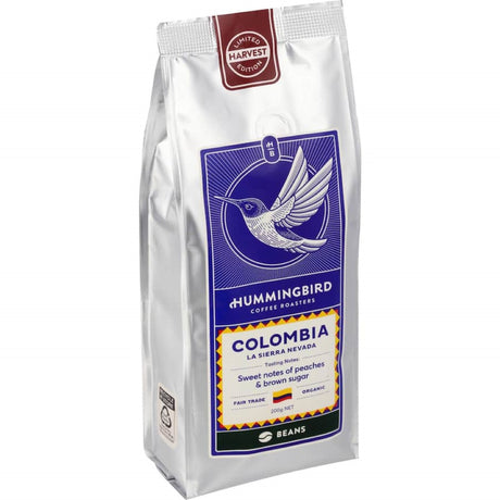 Fair Trade Organic Whole Beans Coffee from Colombia, featuring sweet peach and brown sugar notes in a 200g pack.