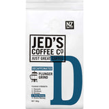 Bold decaf coffee from Jed's, strong dark roast suitable for various brewing methods, 180g, supports sustainability.