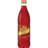 Bottle of Schweppes Concentrate Raspberry Cordial, a vibrant blend for refreshing cocktails and drinks with authentic raspberry flavor.