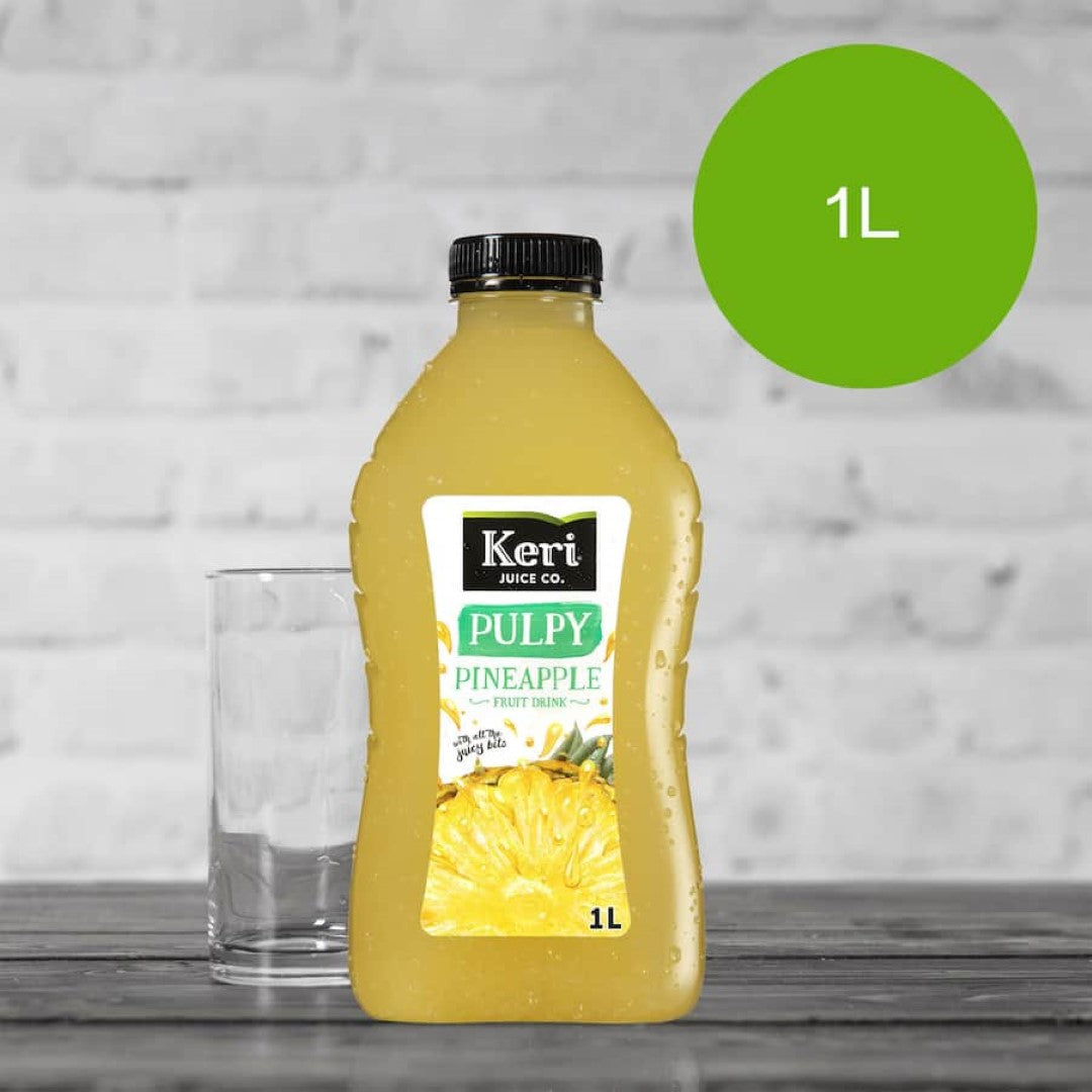 A bottle of Keri Pulpy Fruit Drink Pineapple, showcasing vibrant packaging and real pineapple pulp for a refreshing taste.