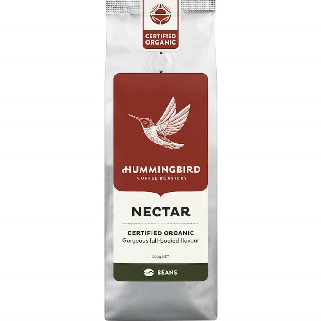 Fair trade organic whole coffee beans, medium roast, with nutty flavors and a clean finish, roasted in New Zealand.