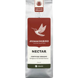 Fair trade organic whole coffee beans, medium roast, with nutty flavors and a clean finish, roasted in New Zealand.