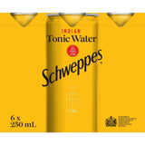 Chilled bottles of Schweppes Indian Tonic Water, perfect for cocktails with crisp effervescence and natural quinine bitterness.