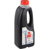 Rich chocolate syrup in a blue and red giraffe bottle, perfect for milkshakes and nostalgic Kiwi treats since 1968.