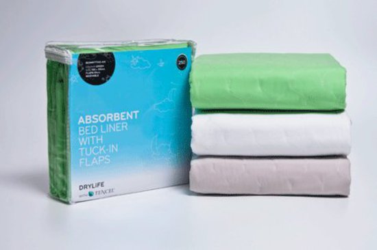 Ultra-soft beige bed pad with absorbent core and waterproof barrier, perfect for mattress protection and enhanced sleep comfort.