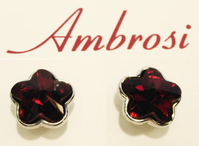 Red flower-shaped crystal stud earrings, featuring Siam glass stone set in palladium for elegance and versatility.